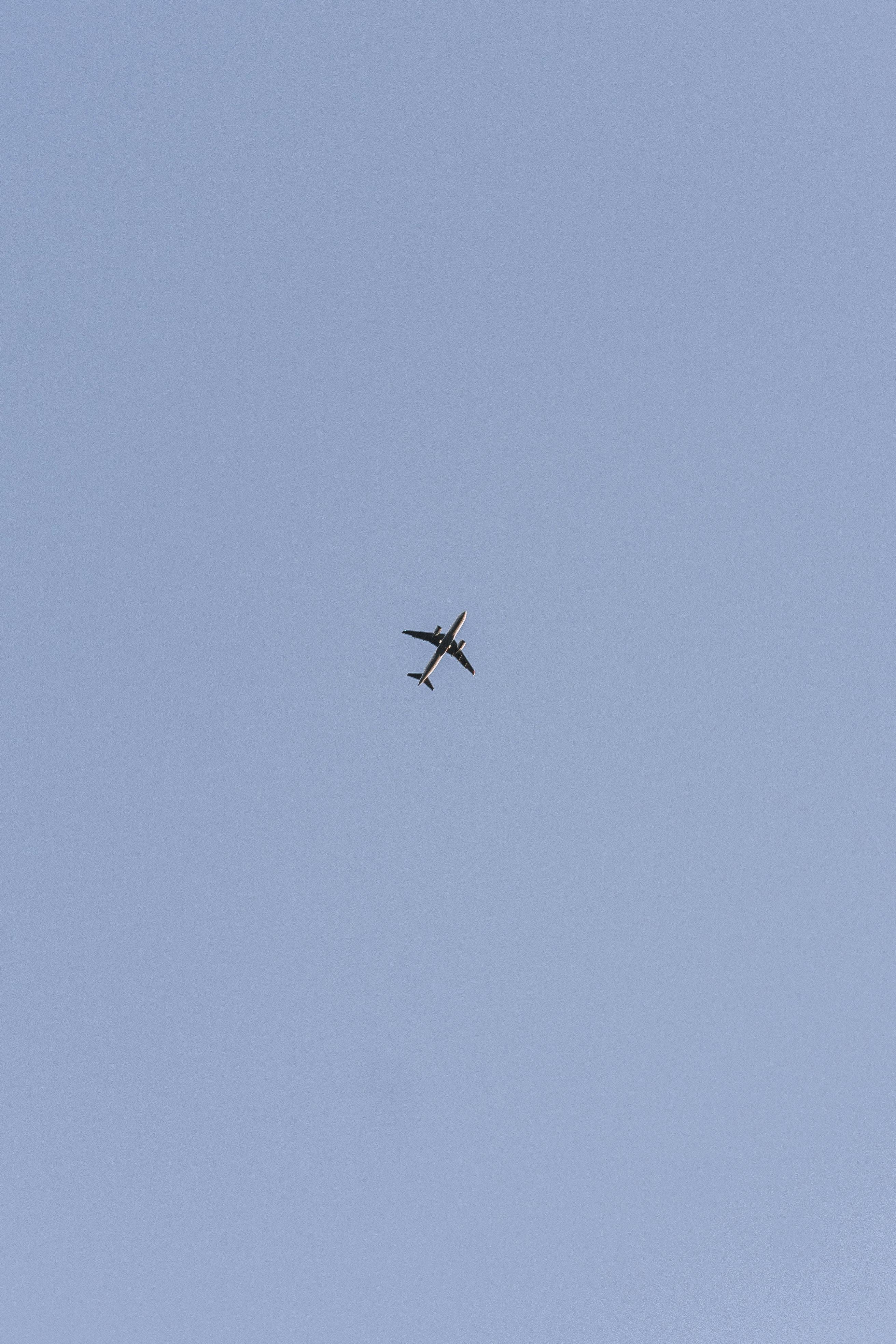 White Plane on Blue Sky · Free Stock Photo