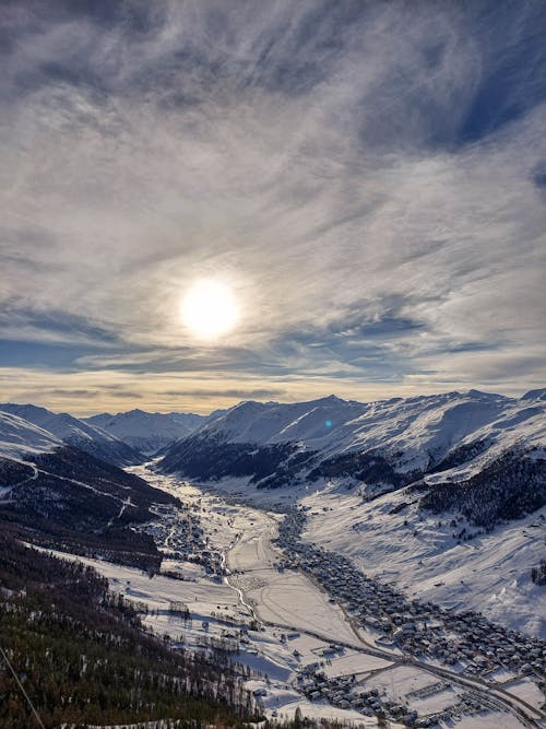 Alpine Village in Valley Covered by Snow