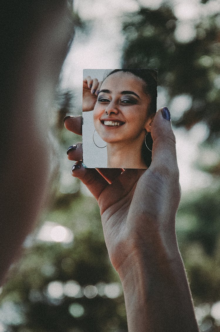 Person Holding A Photo