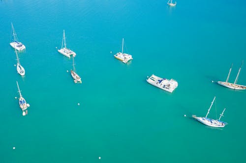 Free Aerial View of Boats on Turquoise Water  Stock Photo