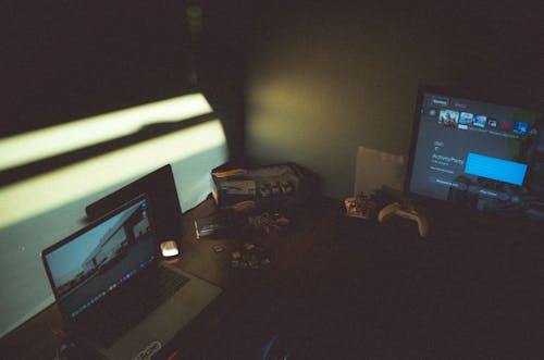 Desk with Computers and Hot Wheels Collection