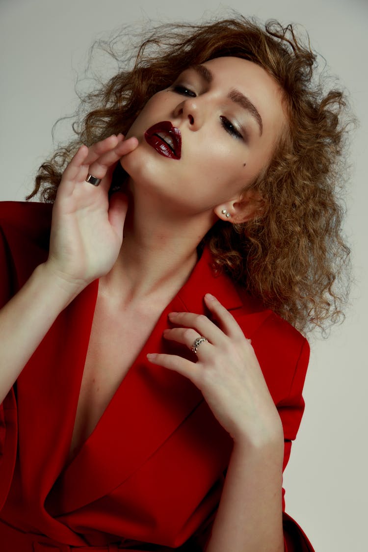 A Beautiful Woman In A Red Blazer