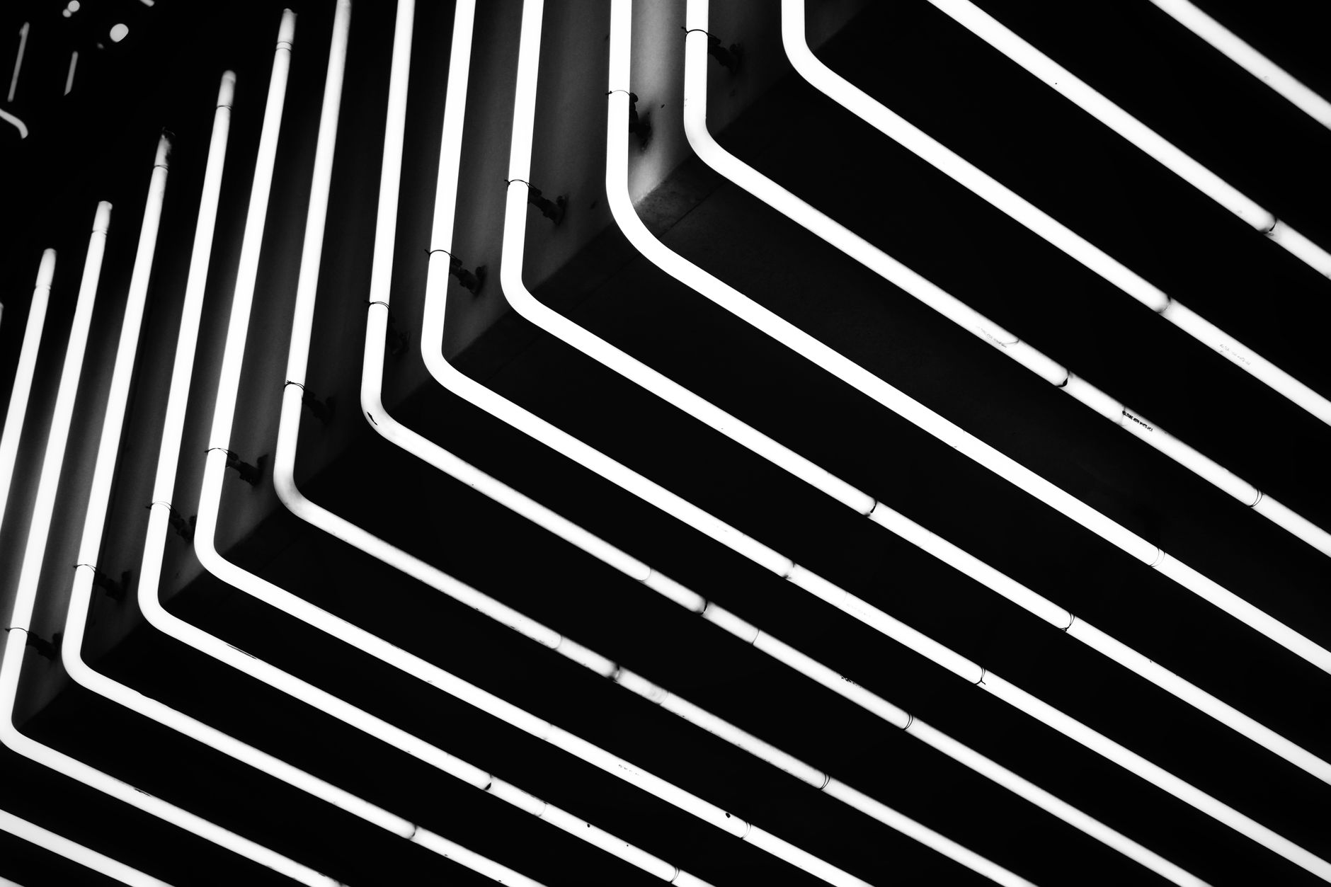 Captivating geometric neon patterns in black and white, perfect for modern urban aesthetics.