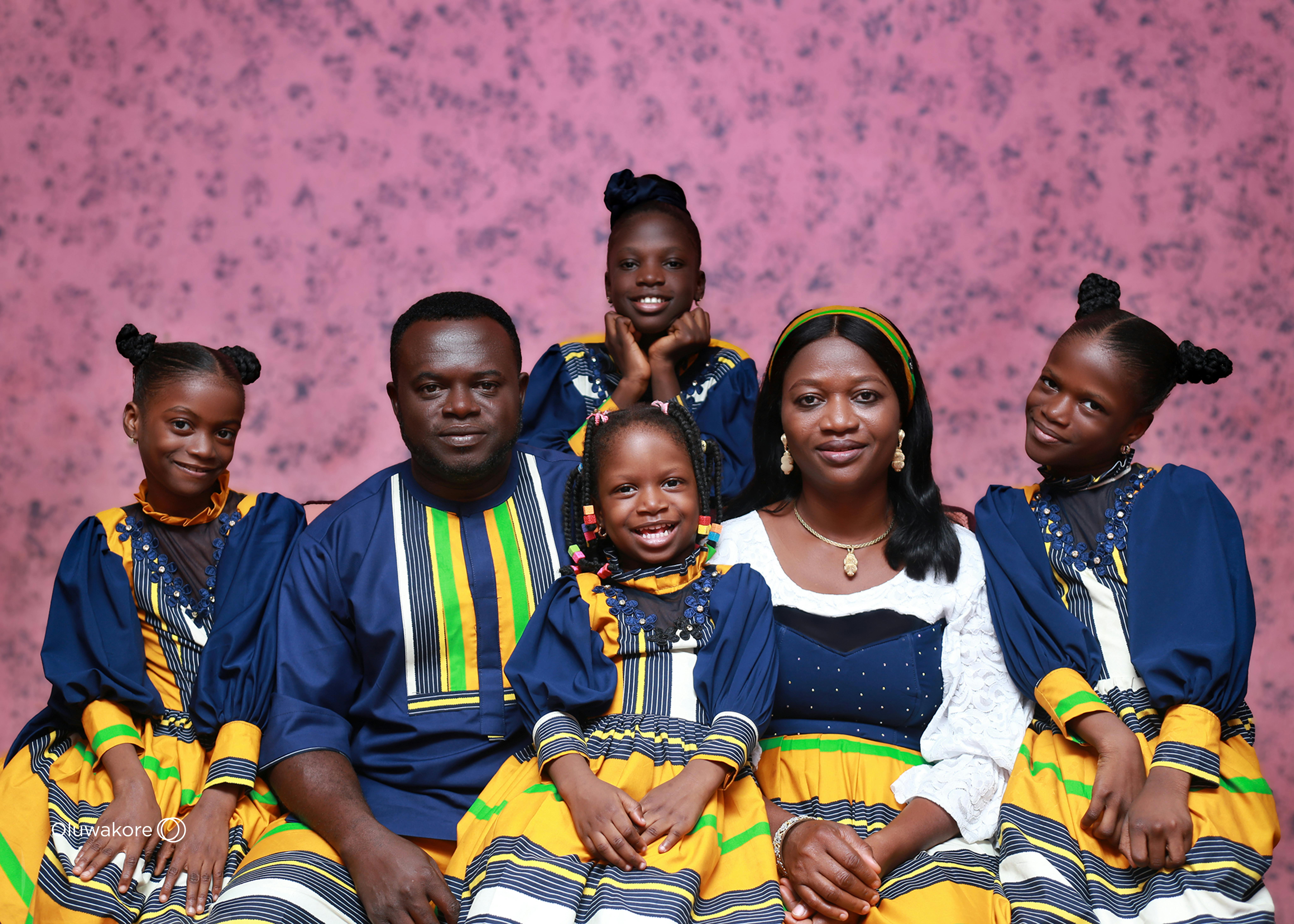 A Big Family Posing for a Portrait in Traditional Clothing · Free Stock  Photo, image size:1050x750