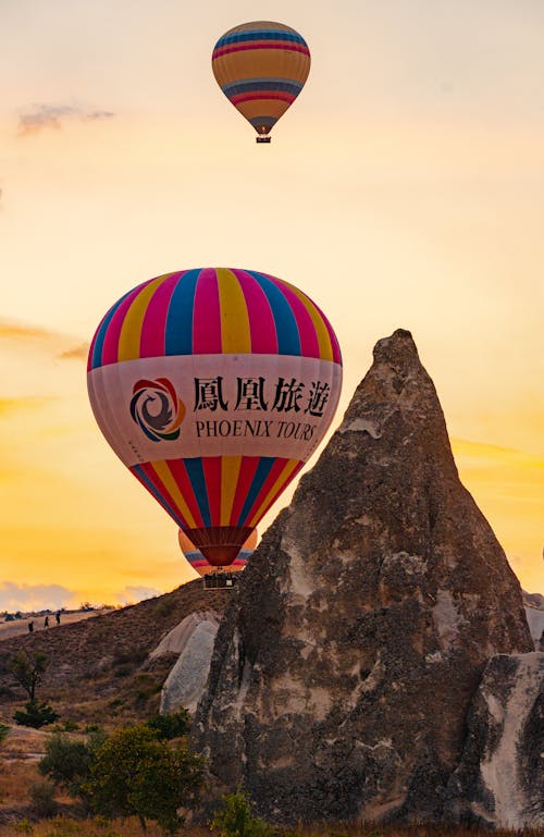 Free Hot Air Balloons in Cappadocia, Turkey at Sunset  Stock Photo