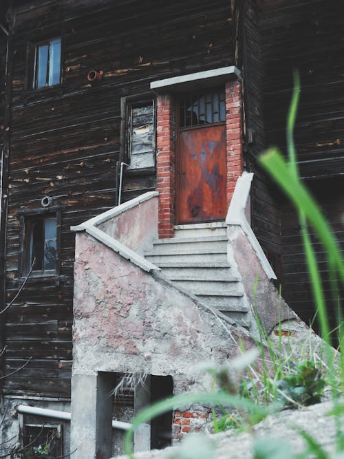 Steps and Door to a Wooden Building 