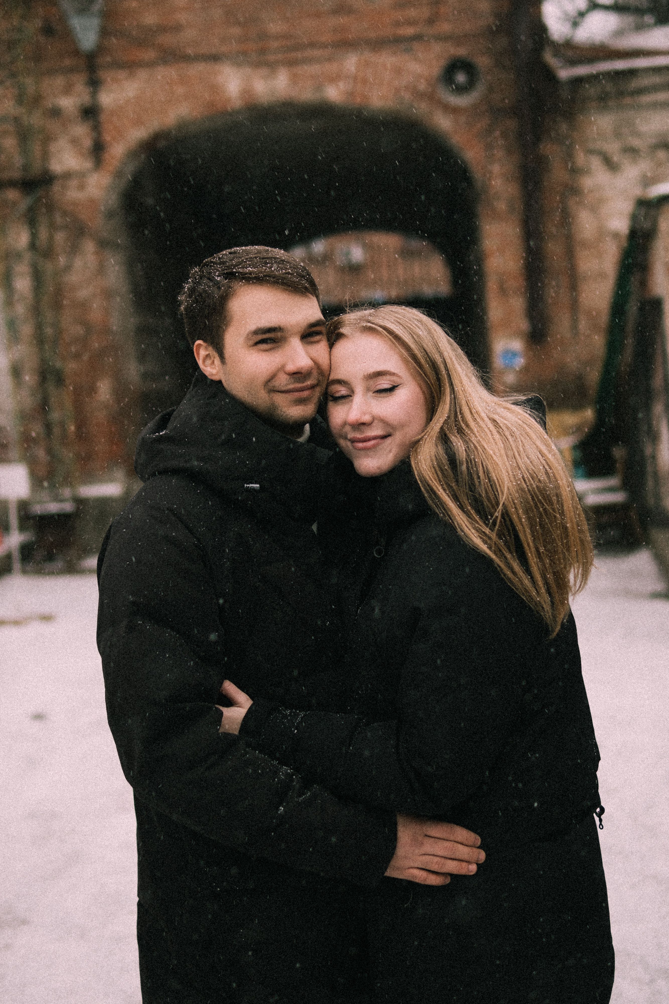 Couple Hugging in Snow · Free Stock Photo