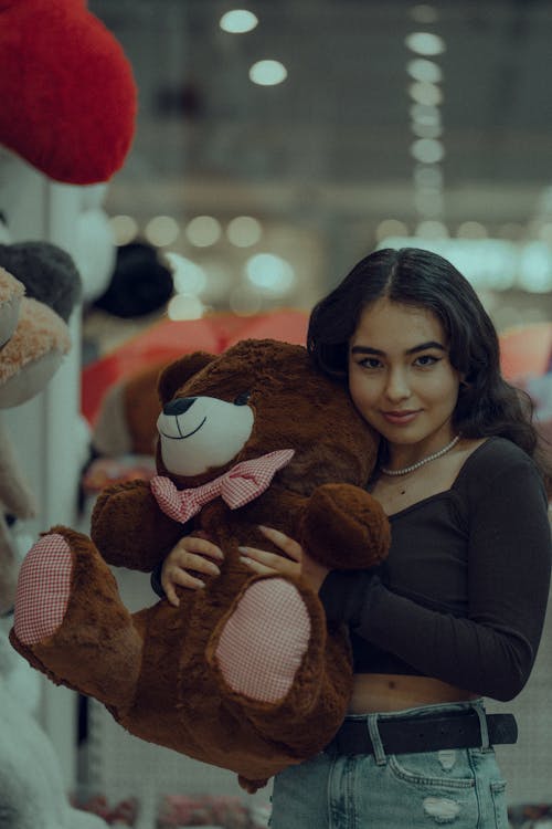 Woman Posing with Teddy Bear