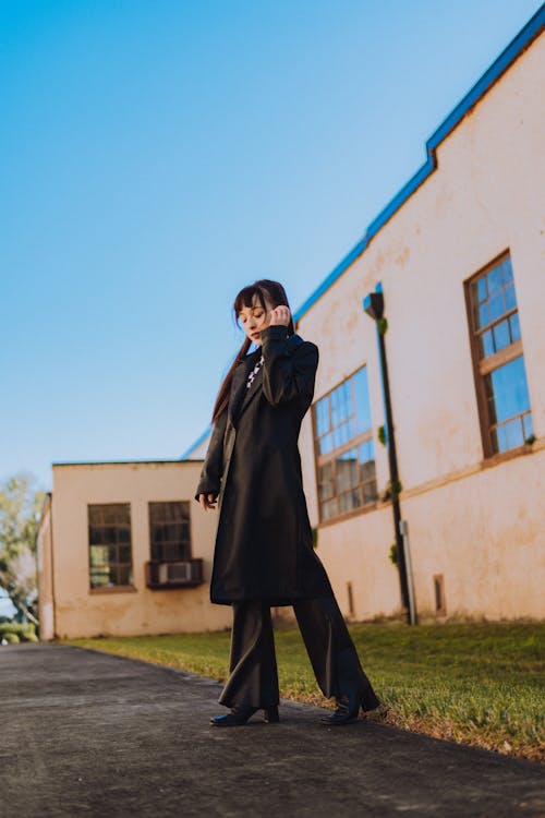 Photo of Woman wearing Black Long Coat
