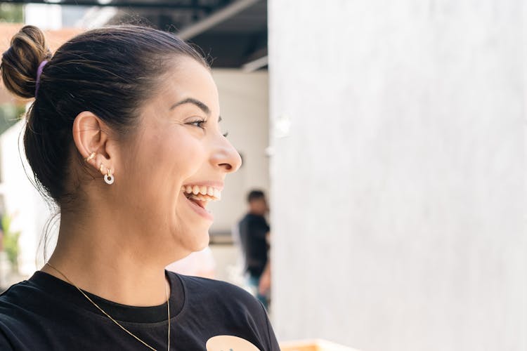 Close Up Photo Of A Woman Laughing