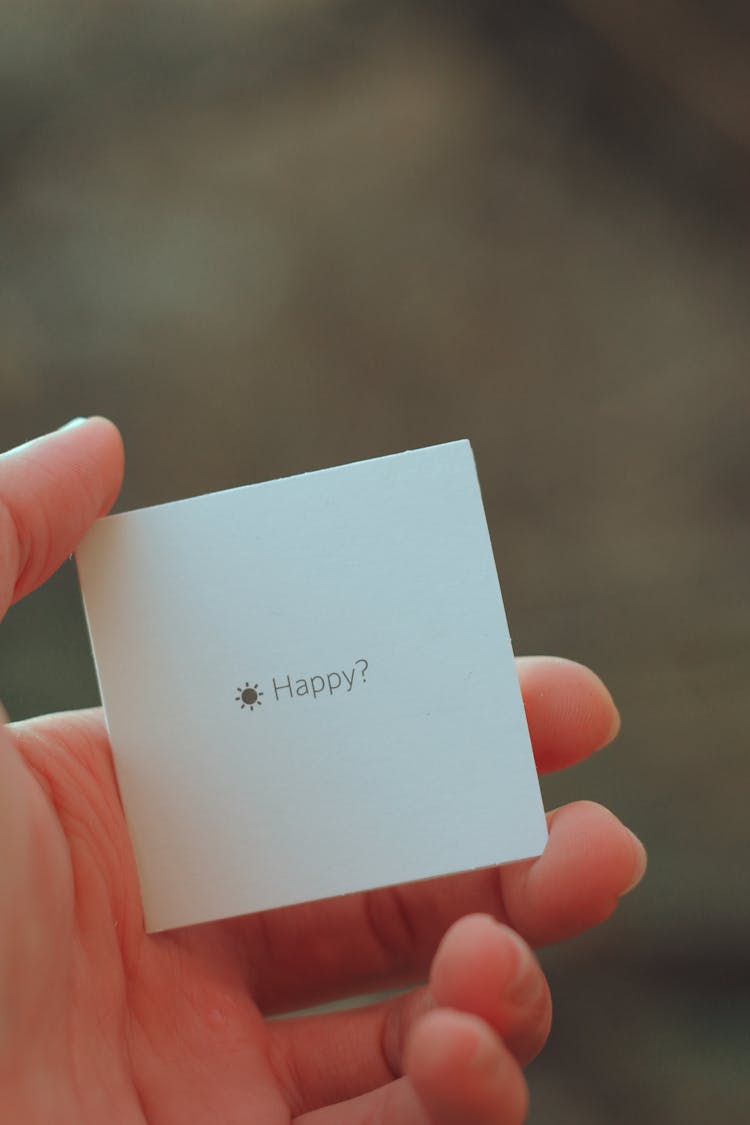 Hand Holding Card With Question