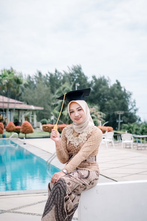 Woman Posing with Academic Hat on Hijab