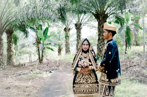 A Couple Wearing Traditional Clothes