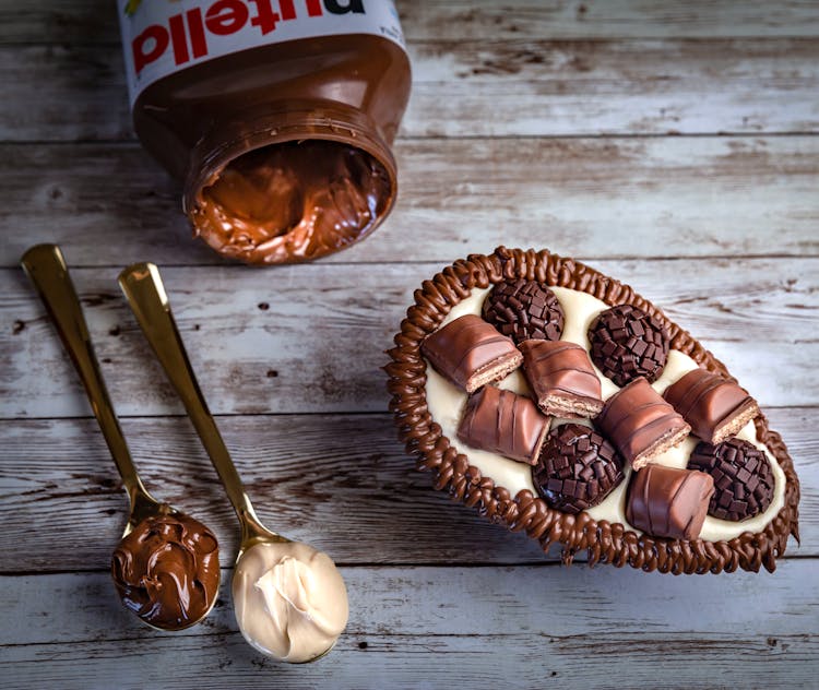 Cake With Chocolate Bars And Cream