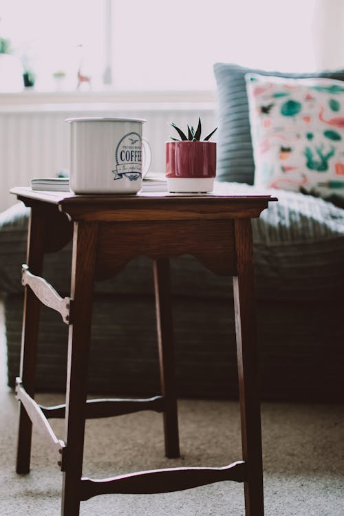 Free Selective Focus Photography of White Mug on Wooden Stool Stock Photo