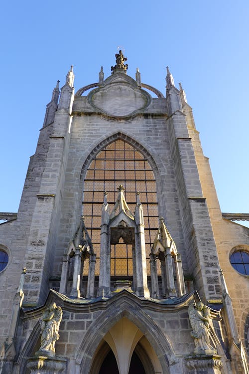 Low Angle Shot of a Gothic Cathedral with Architectural Detail