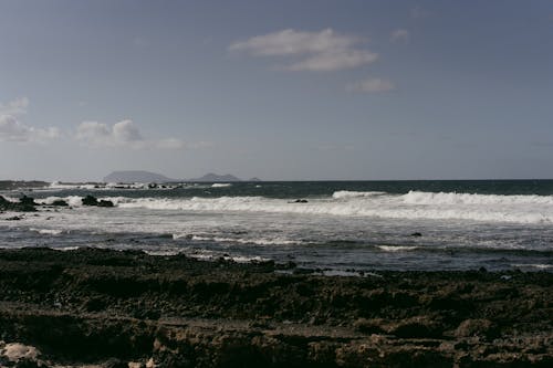 Waves Splashing on Seashore in Nature