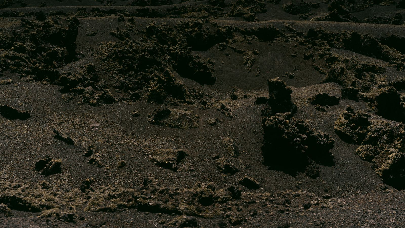Rocks and sand in volcanic soil, Cameroon