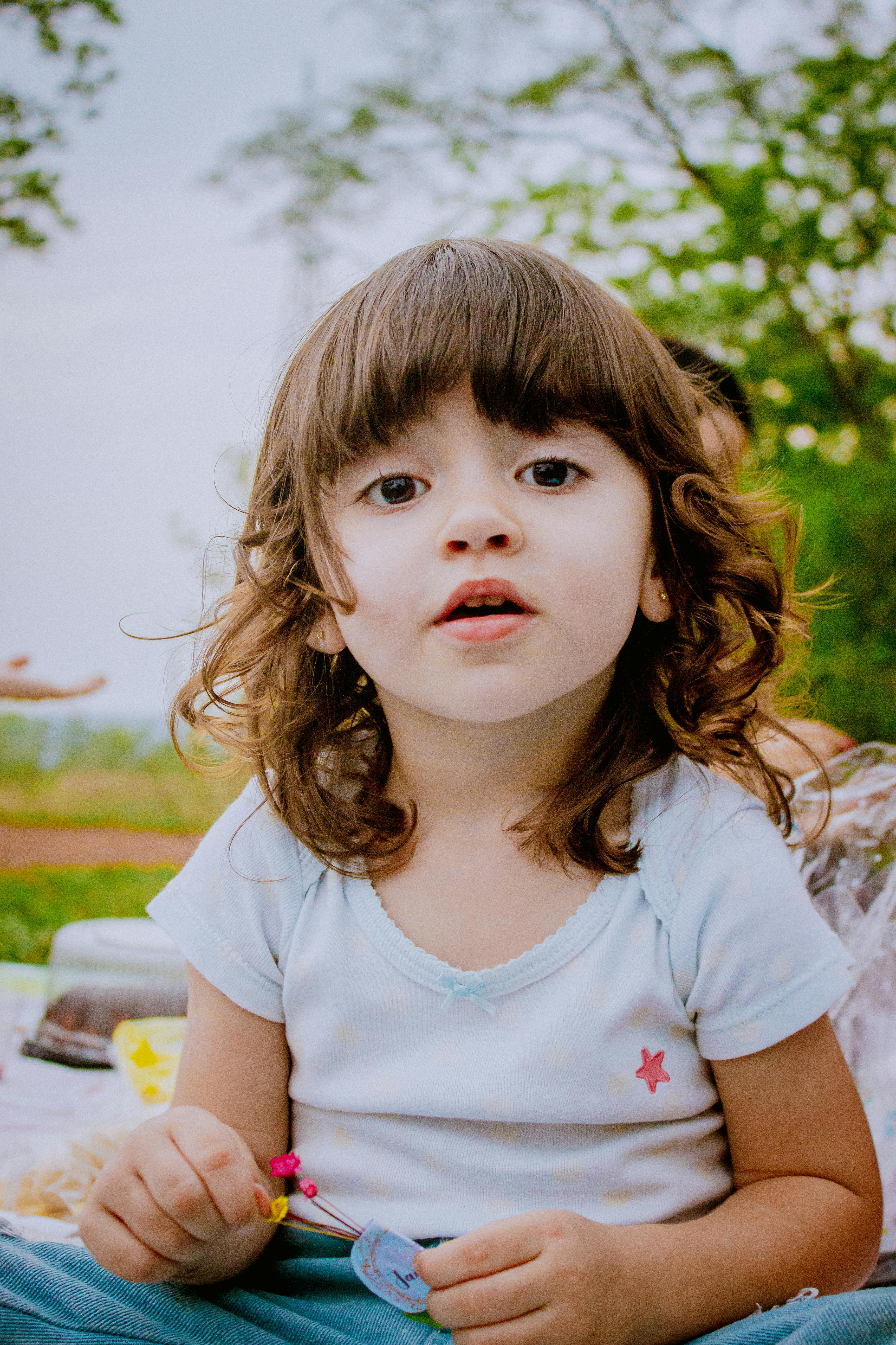 a girl in a white shirt