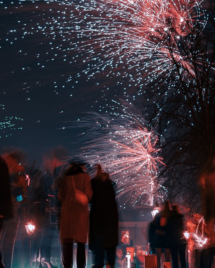 People Watching Fireworks At Night