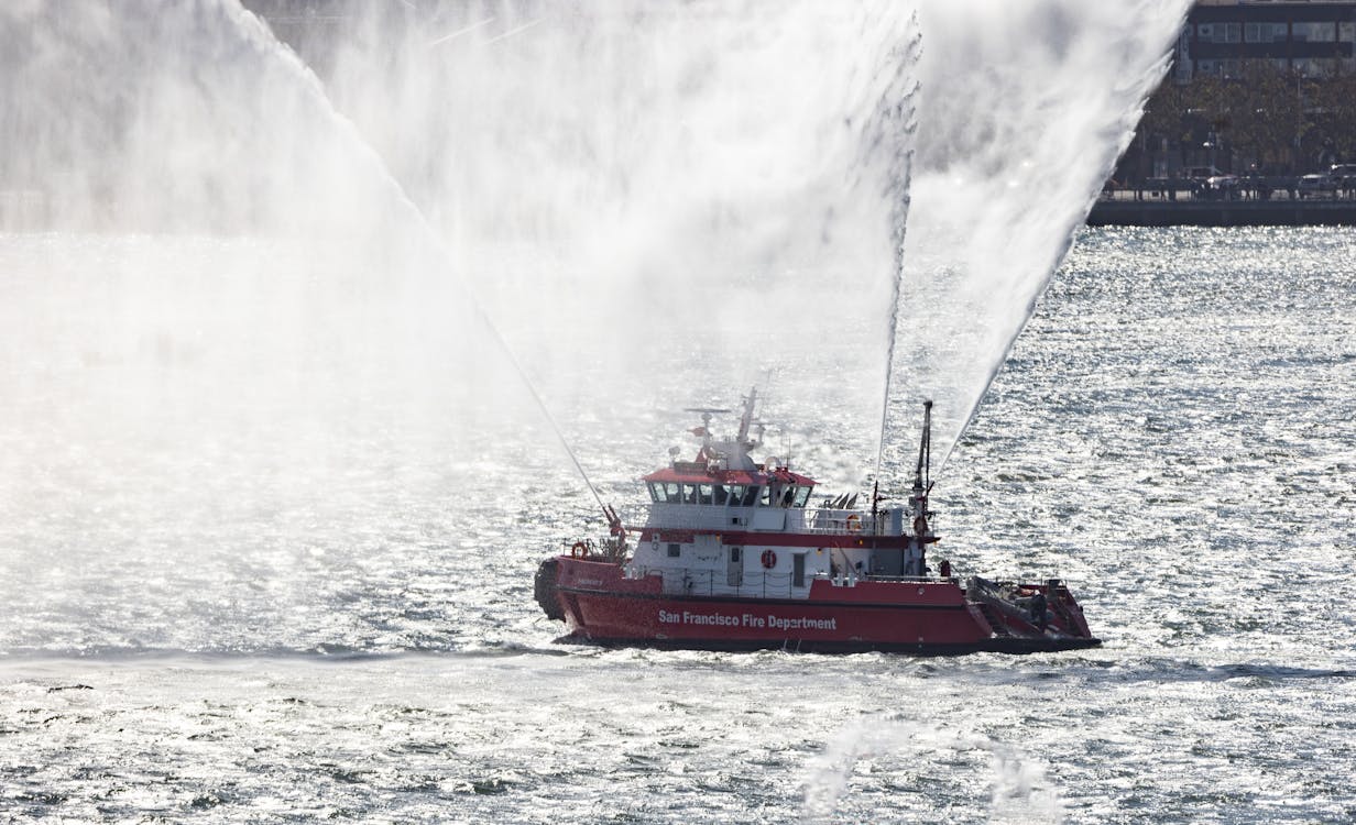 Fireboat on the Ocean · Free Stock Photo