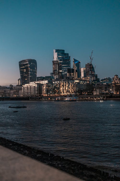 River Thames with Canary Wharf Skyscrapers, in London, UK