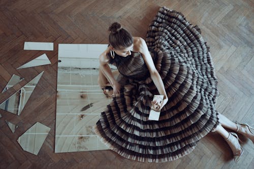 Woman Wearing Dress, Broken Mirror on Floor