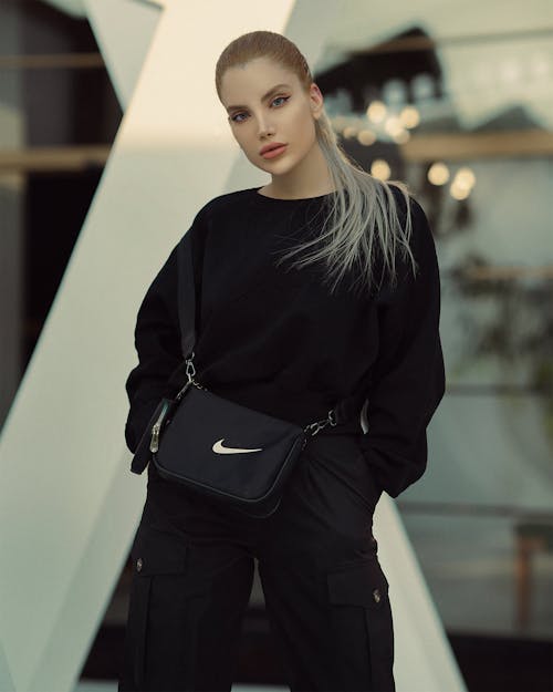 Blonde in Cargo Pants and Nike Bag