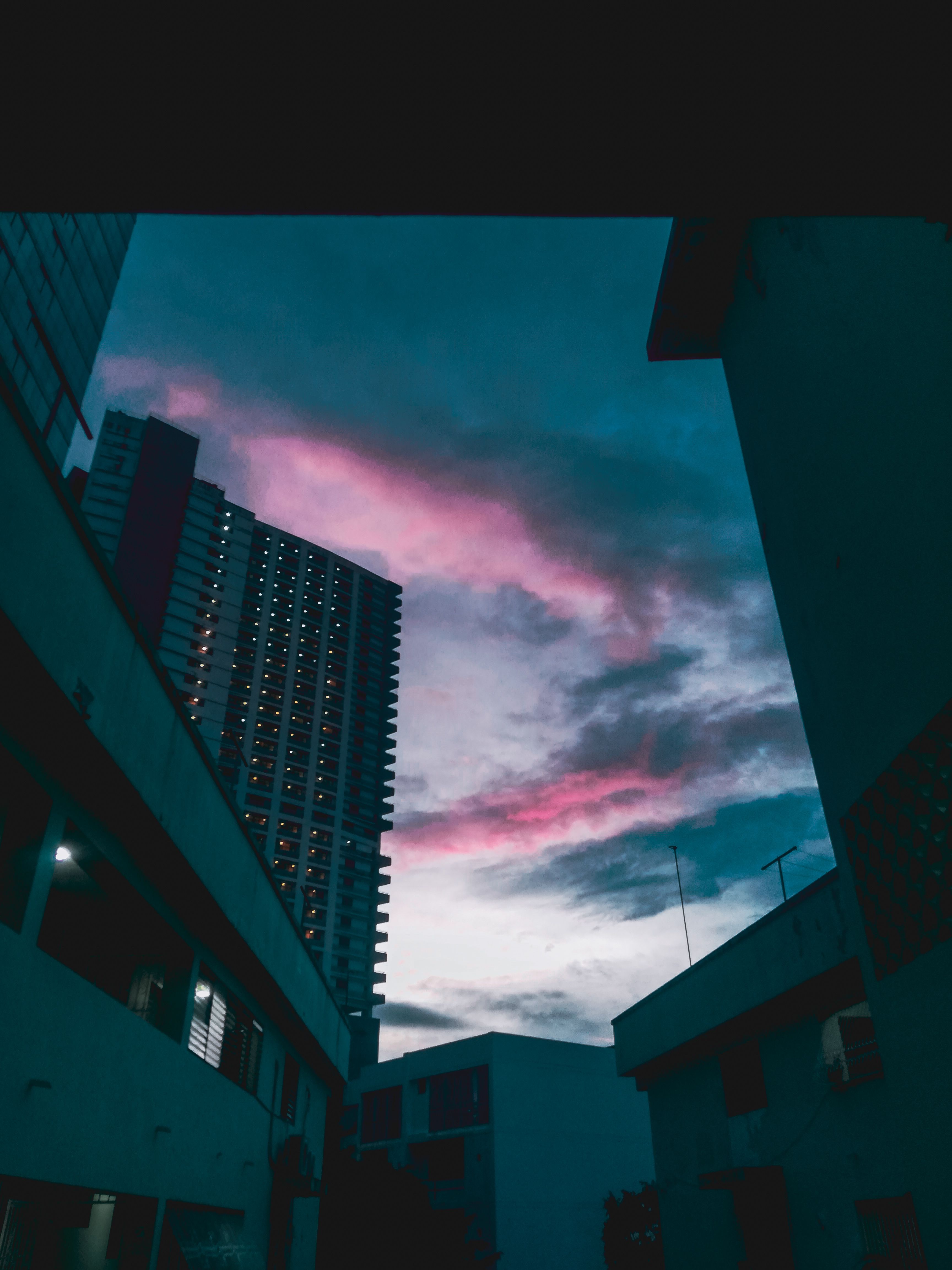 Panama City buildings silhouetted against a colorful twilight sky, capturing urban beauty at dusk.