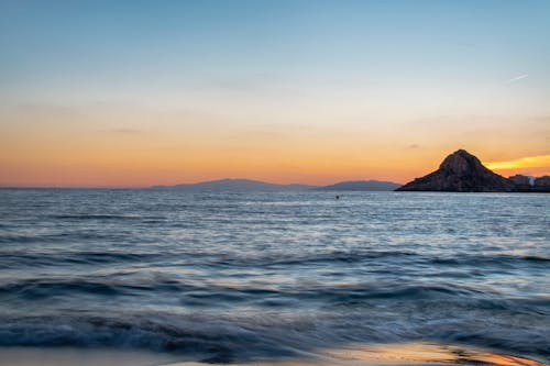 Безкоштовне стокове фото на тему «берег, Захід сонця, море»