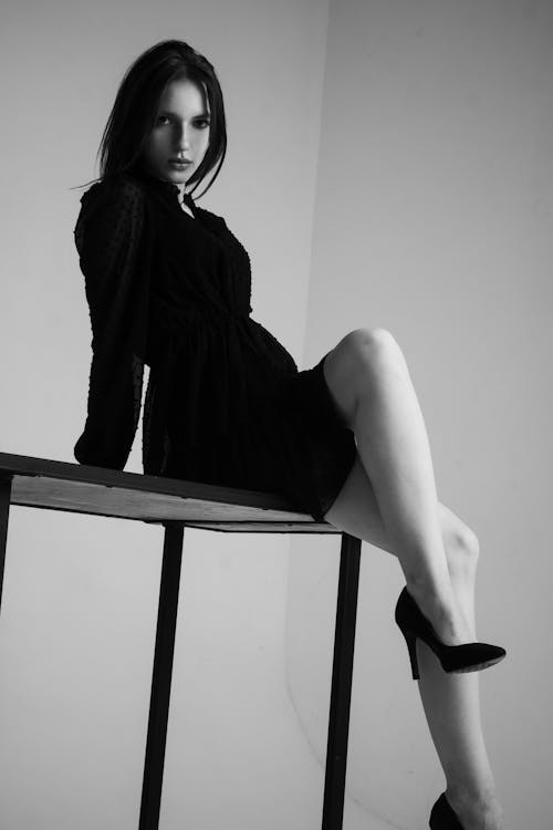 Grayscale Photo of a Female Model in Black Dress Posing