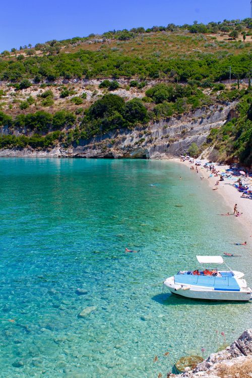 Free A captivating aerial view of a boat by a scenic Zakinthos beach in Greece. Stock Photo