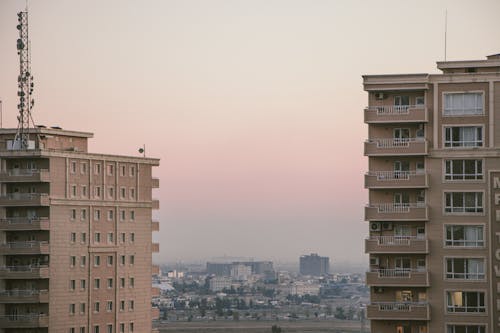 Clear Sky over Town Buildings at Dusk