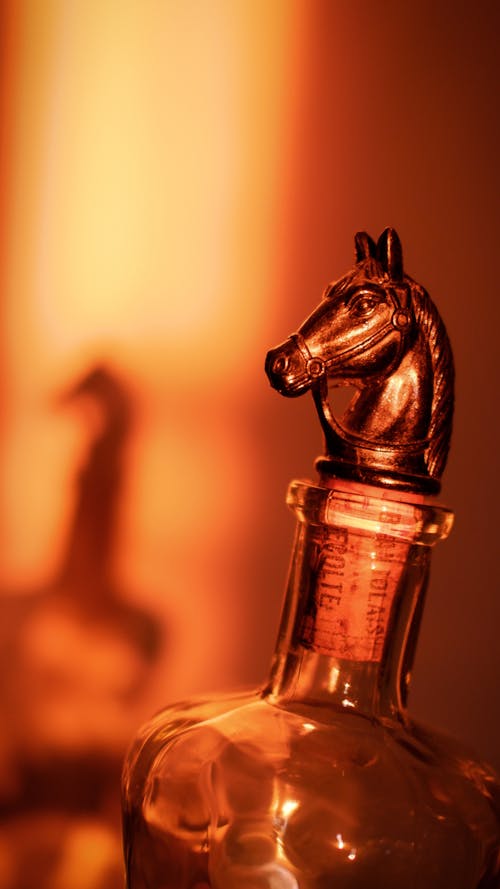 Glass Bottle with a Bottle Cork in Form of a Horse Head