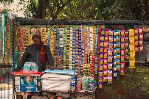 Man Selling on City Street