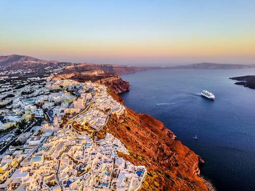 Aerial Photo of White Buildings Near a Bay
