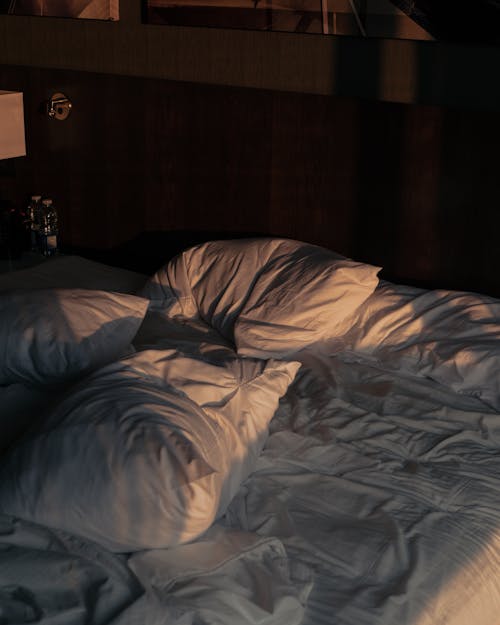 Free White Pillows on White Bed Stock Photo