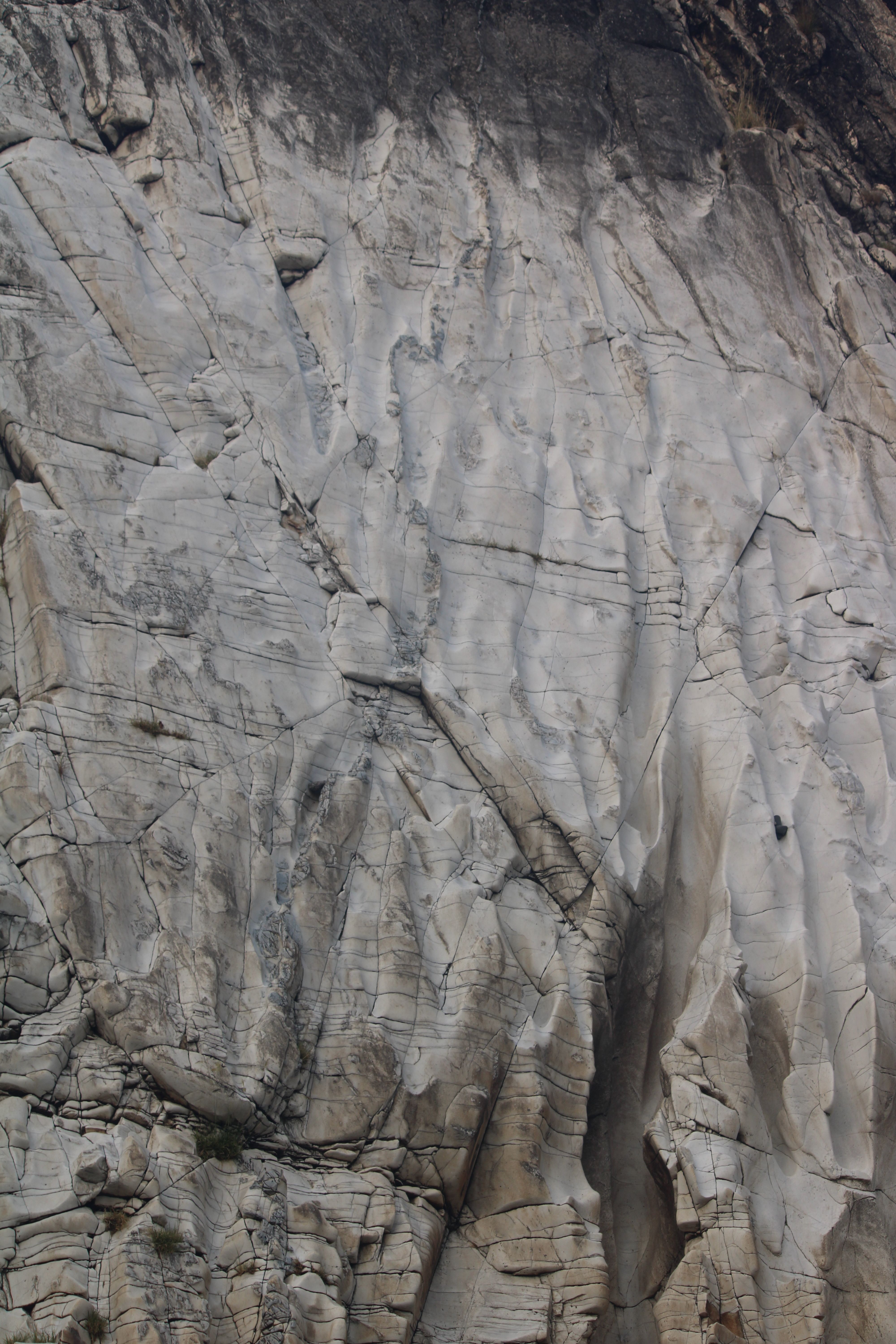 Granite face showing stratified rock layers and natural structural integrity