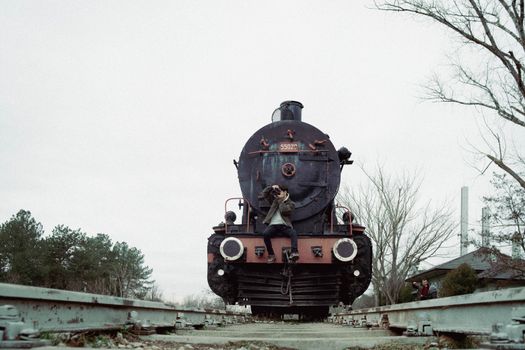 A vintage steam train at Karaağaç Station in Edirne, Türkiye, evoking nostalgia.