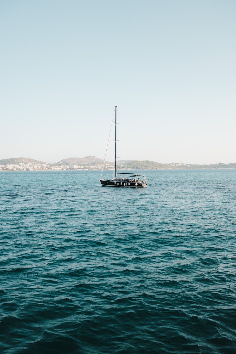 Sailing Boat In A Sea 