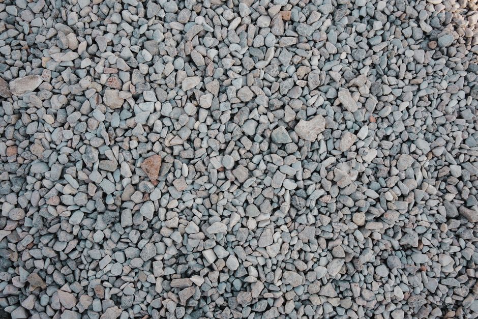 Stone Patio Success: Your Guide to Local Contractors Compacted gravel base for stone patio installation - stone patio contractors near me