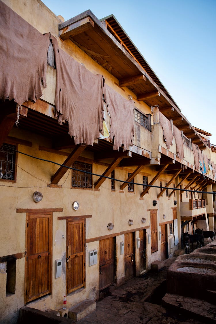 Facade Of A Building With Drying Fabrics In Fez, Marocco