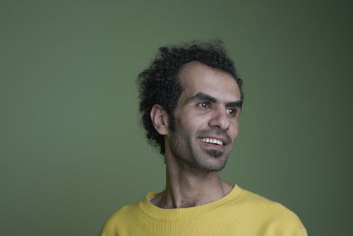 Man in Yellow Shirt Smiling