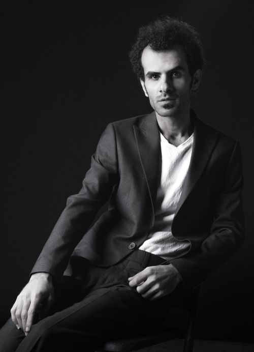 Free Sophisticated black and white portrait of a man in a suit, exuding confidence. Stock Photo