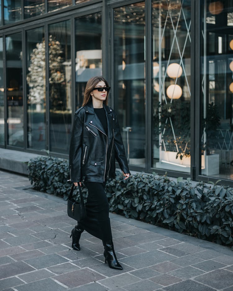 Beautiful Woman Walking On City Street