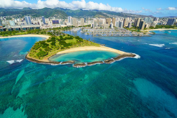 Aerial View Of Island Near City Buildings