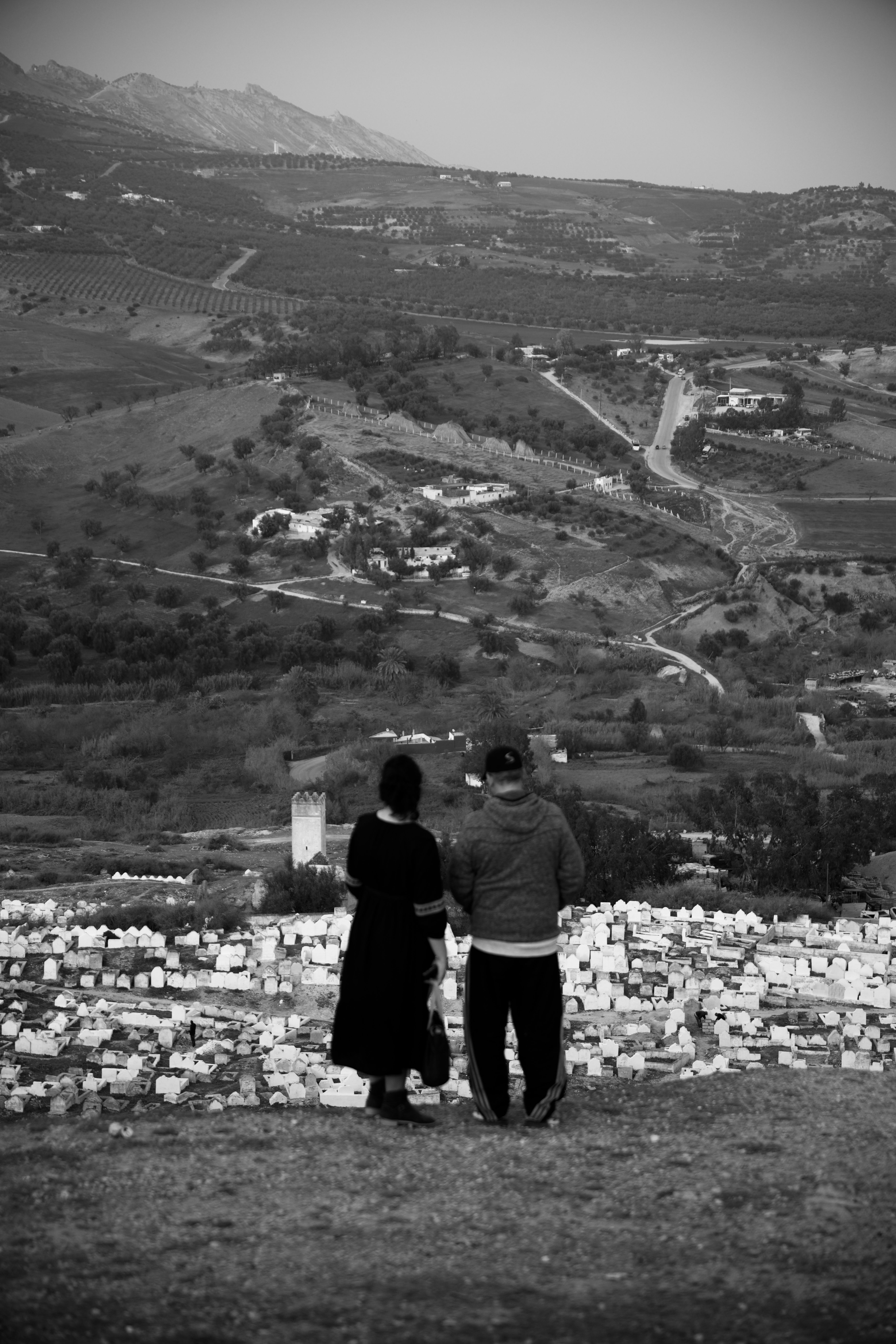 Couple Standing Together on Mountain Top · Free Stock Photo