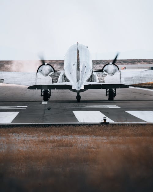 Free An Airplane on an Airstrip Stock Photo