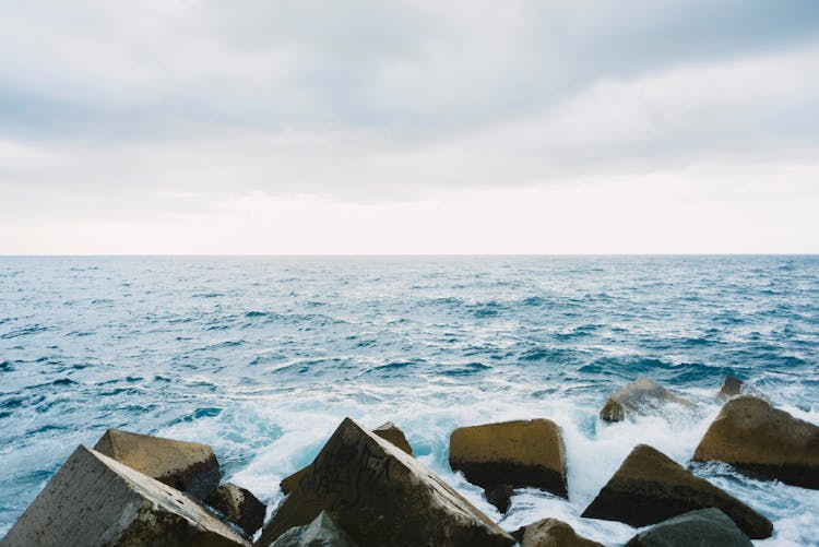 Waves Splashing On The Rocky Shore 