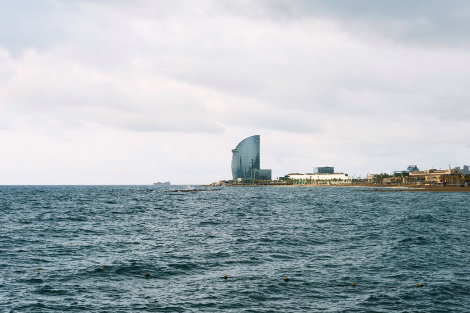 Panoramic view of the modern W Barcelona hotel on the coastline